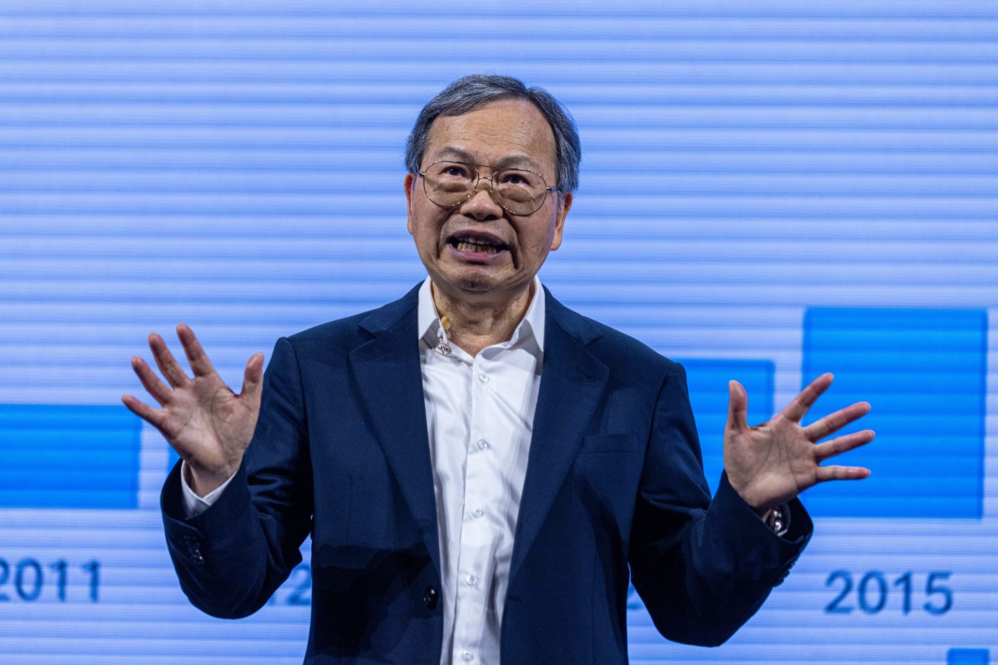 Man gesturing during business presentation