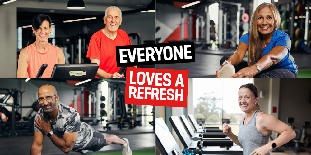 Three people smiling in fitness center