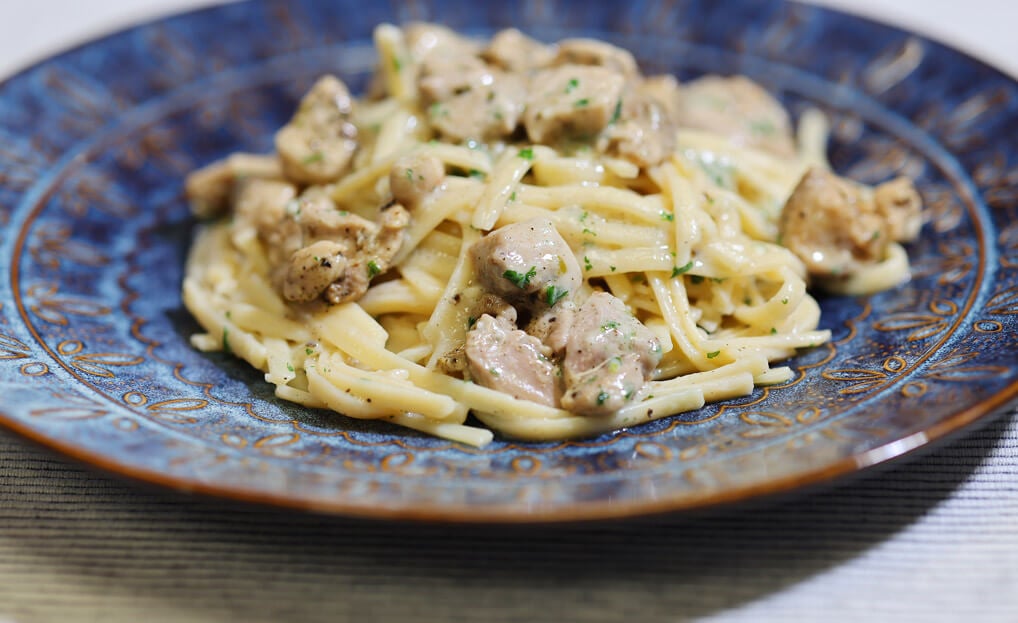 Creamy chicken alfredo on fettuccine