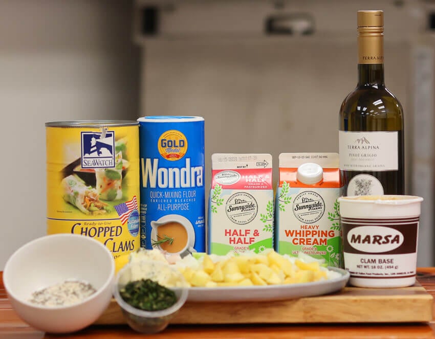 Clam chowder ingredients on cutting board