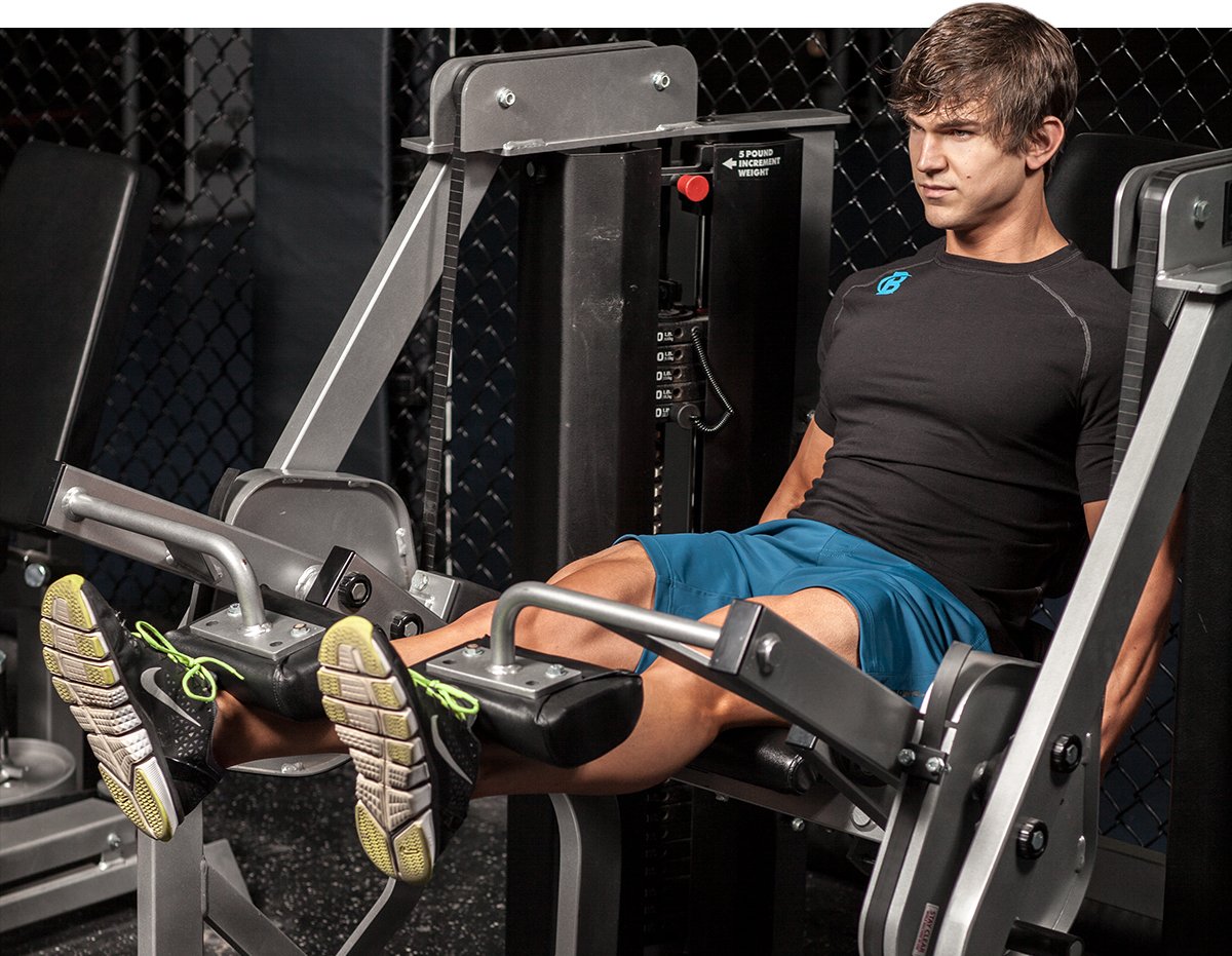 Man using leg press machine