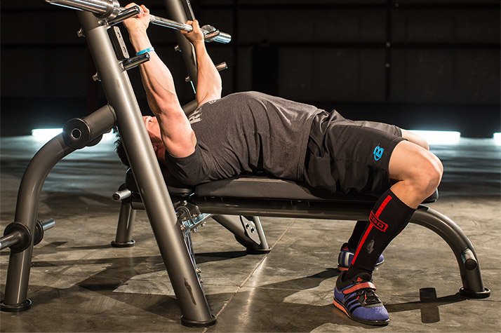 Man demonstrating proper bench press form