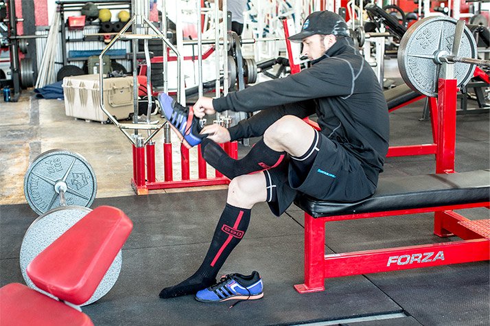 Man demonstrates bench press technique