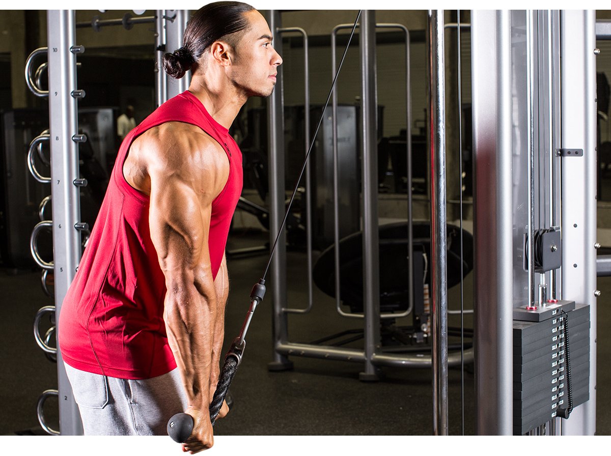 Man doing tricep pushdown exercise