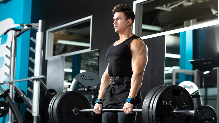 Man performing deadlift at gym