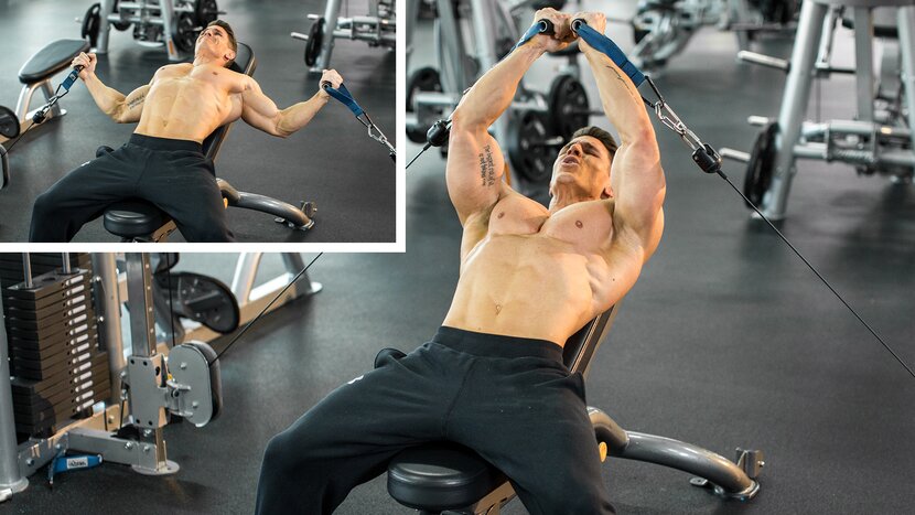 Man performing dumbbell chest flyes