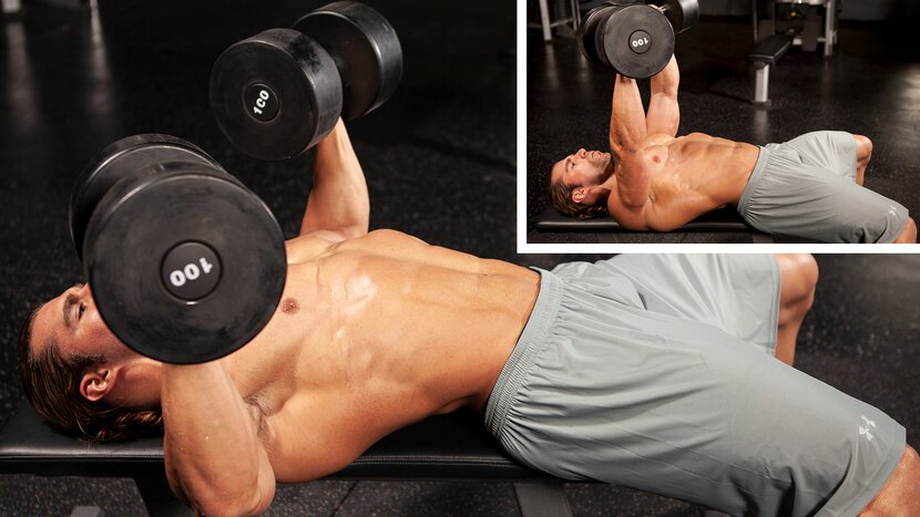 Man performing dumbbell bench press