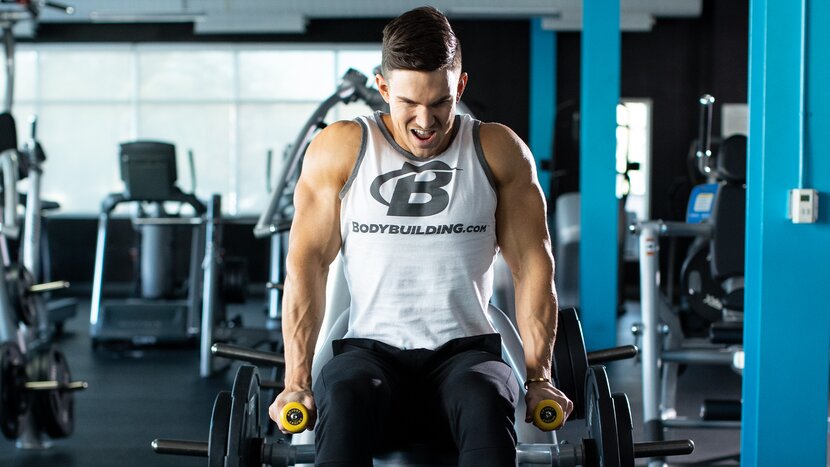 Man doing chest workout with dumbbells