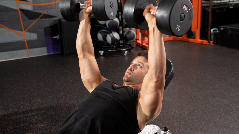 Man doing bench press workout