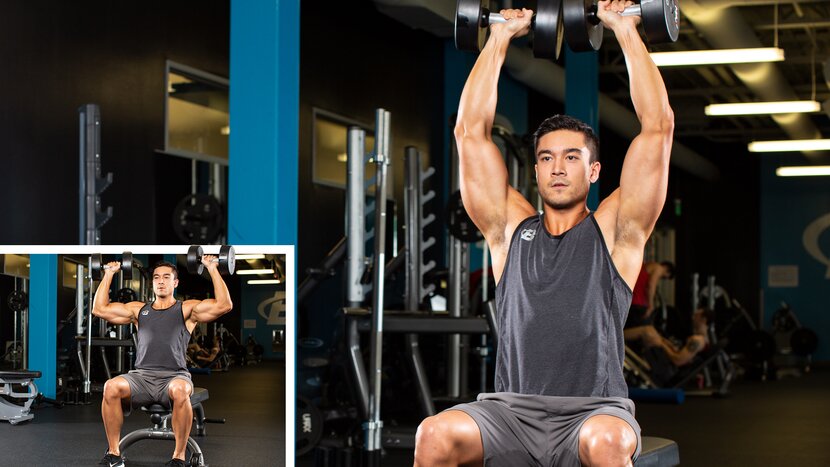 Man doing seated dumbbell shoulder press