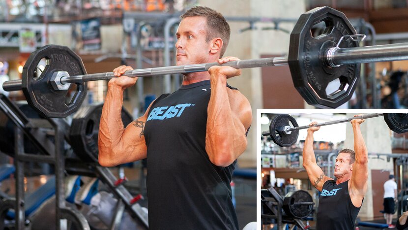 Man performing standing military press