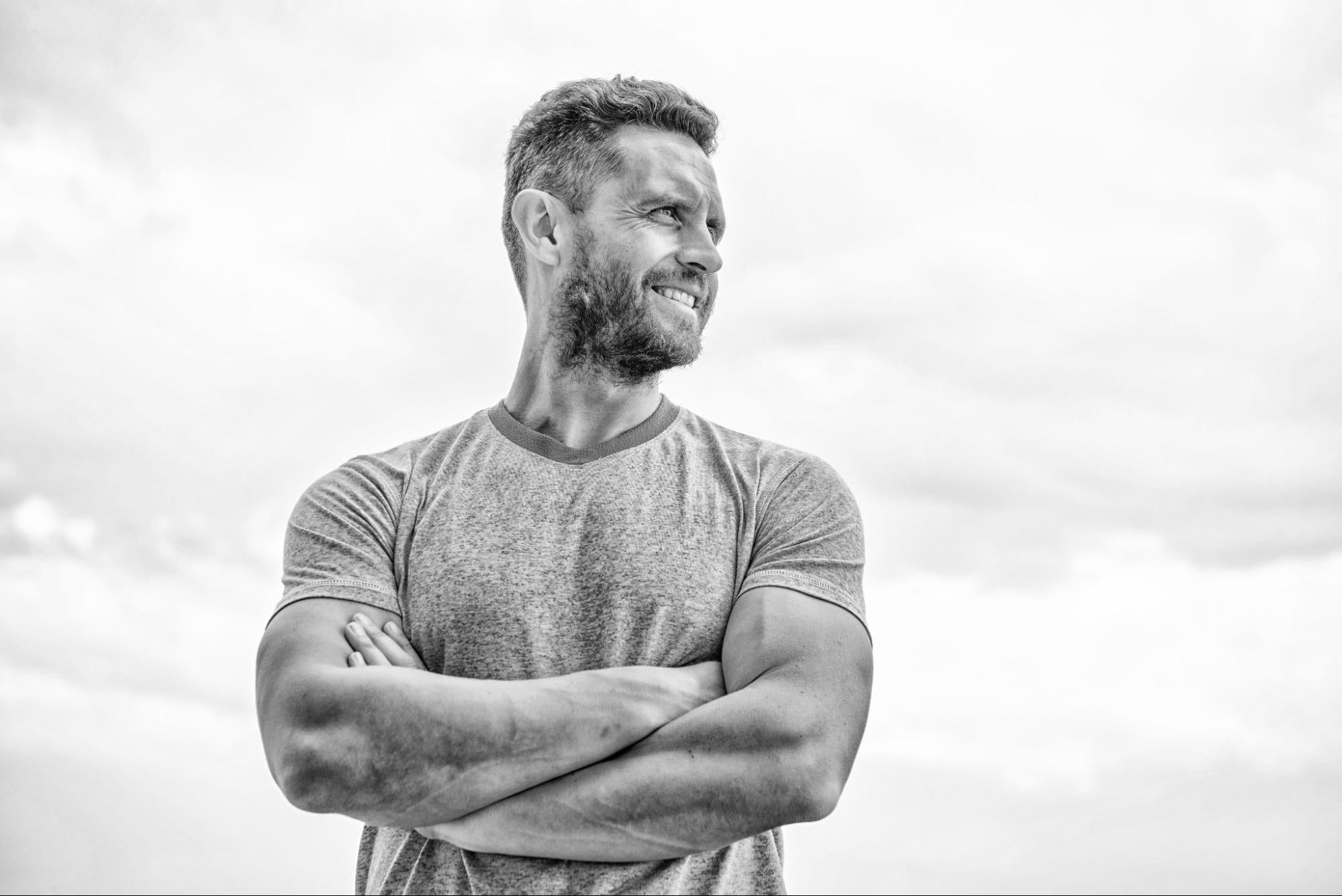 Man smiling in gym setting