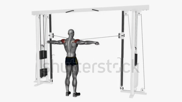 Man performing cable machine exercise