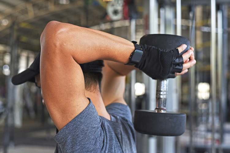 Man lifting dumbbell during workout