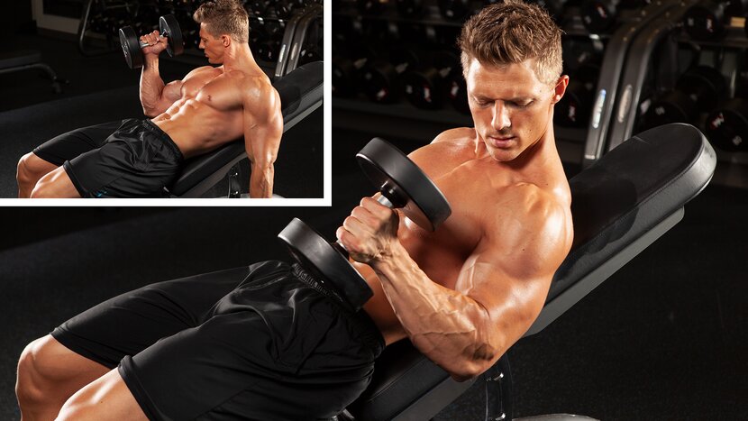 Man doing incline dumbbell curl