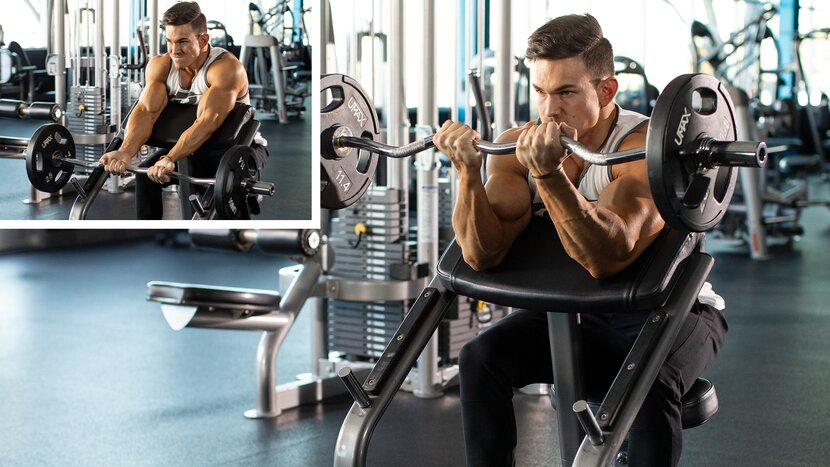 Man performing preacher curls