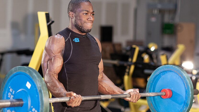 Man performing heavy bicep curl