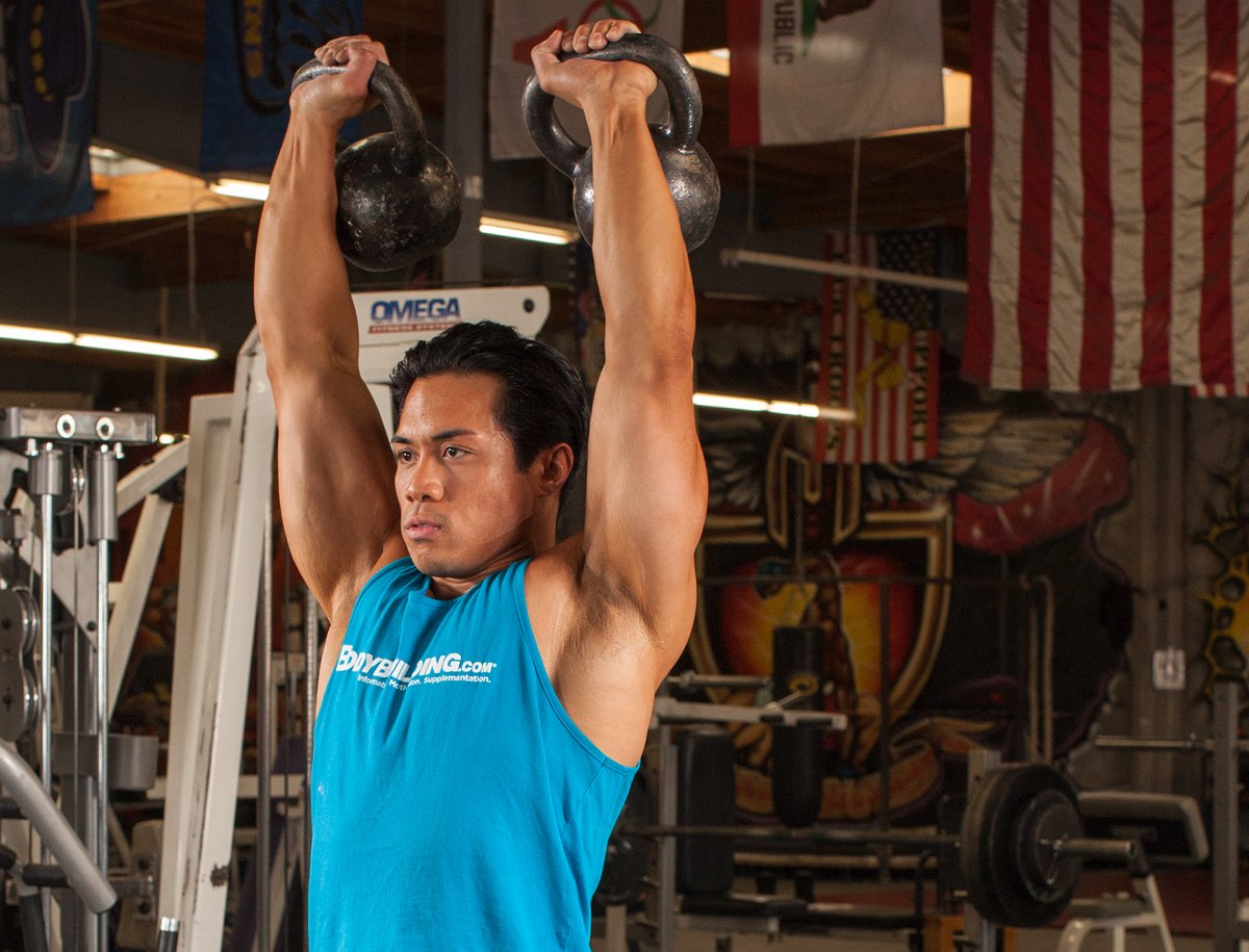 Man exercising with kettlebell