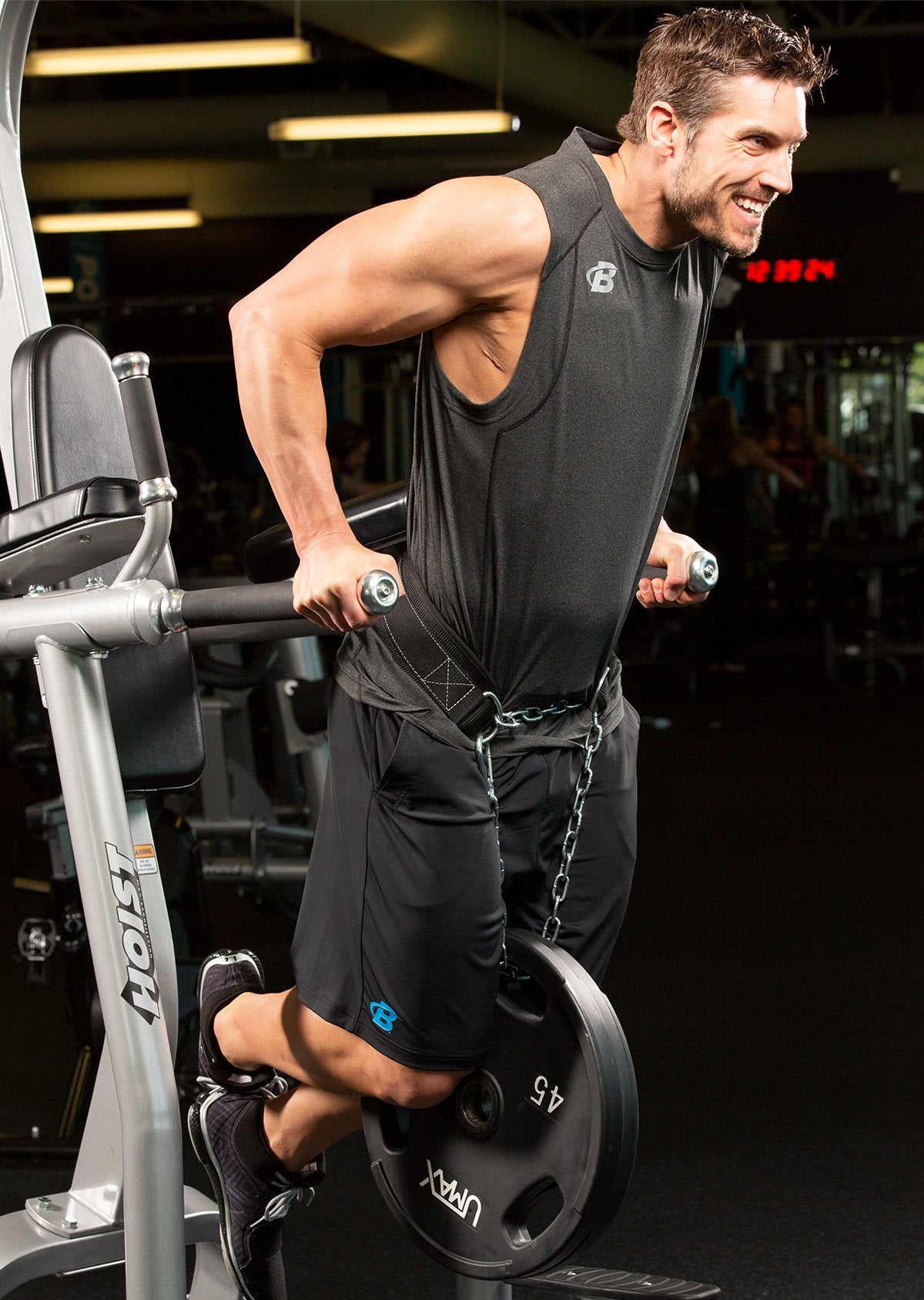 man using chest press machine