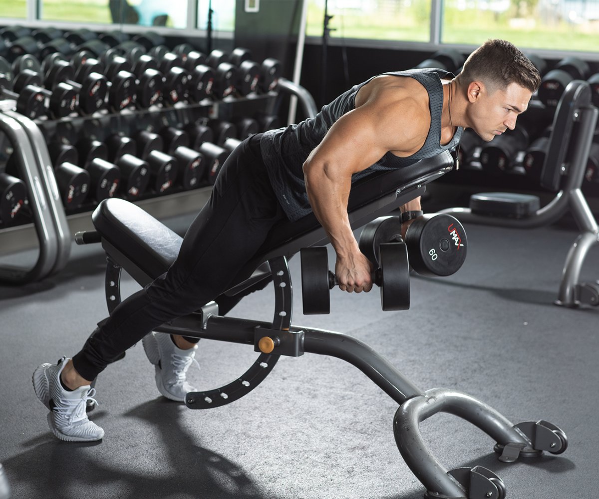 Man performing dumbbell bench row