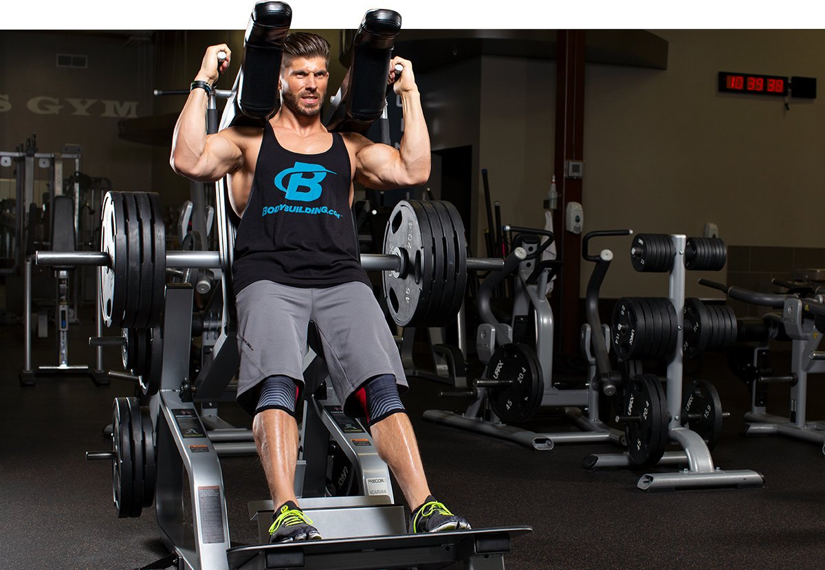 Man on leg press machine