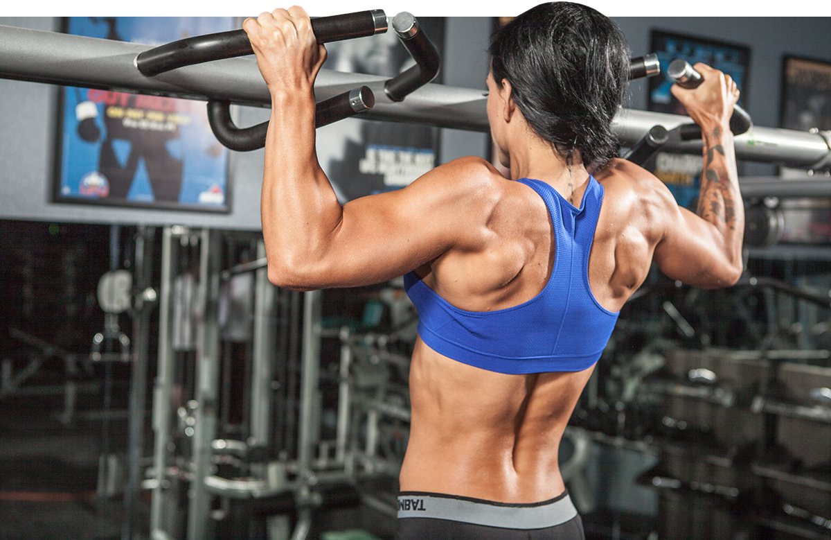 Woman performing pull-ups