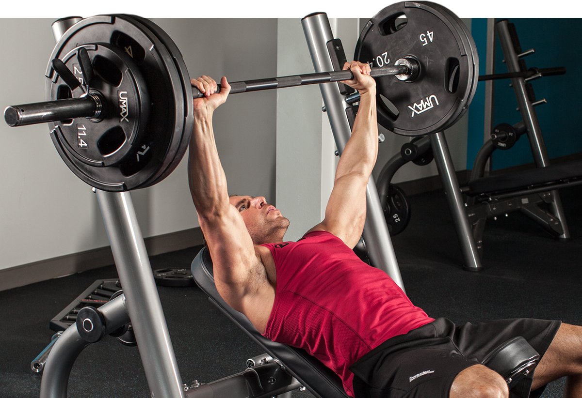 Man performing dumbbell bicep curl