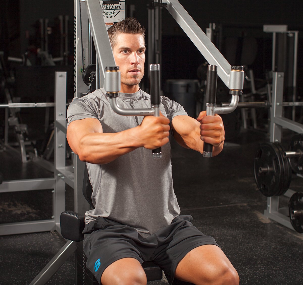 Man exercising on chest press machine