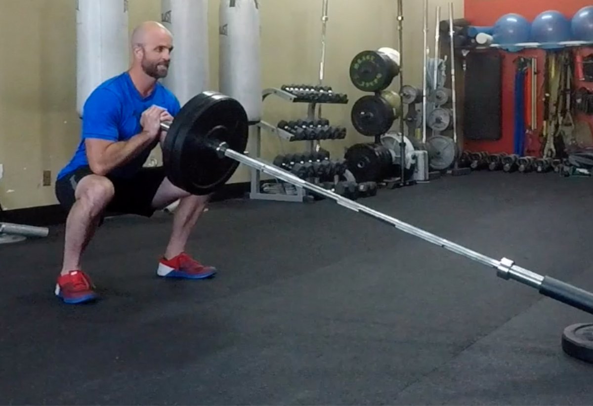 Man doing landmine press