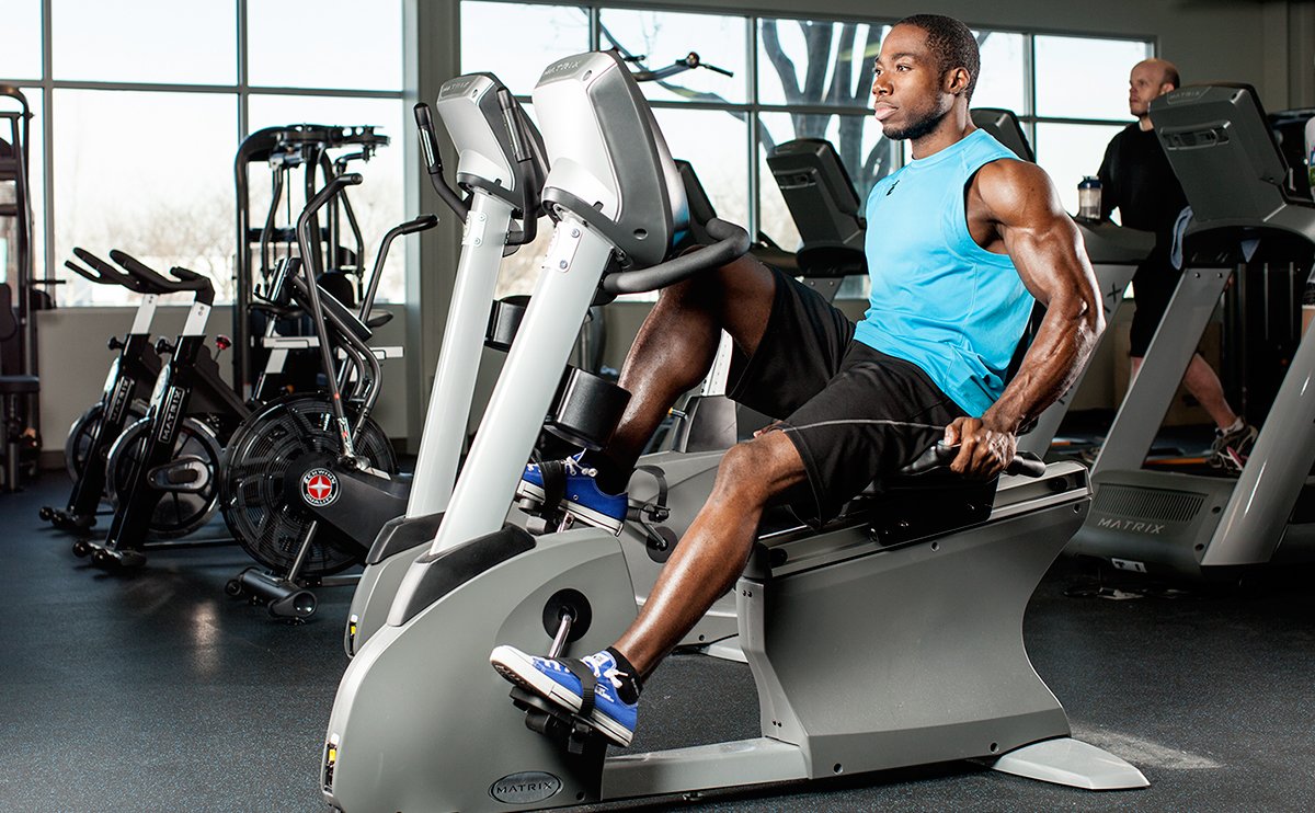 Man using indoor cycling machine