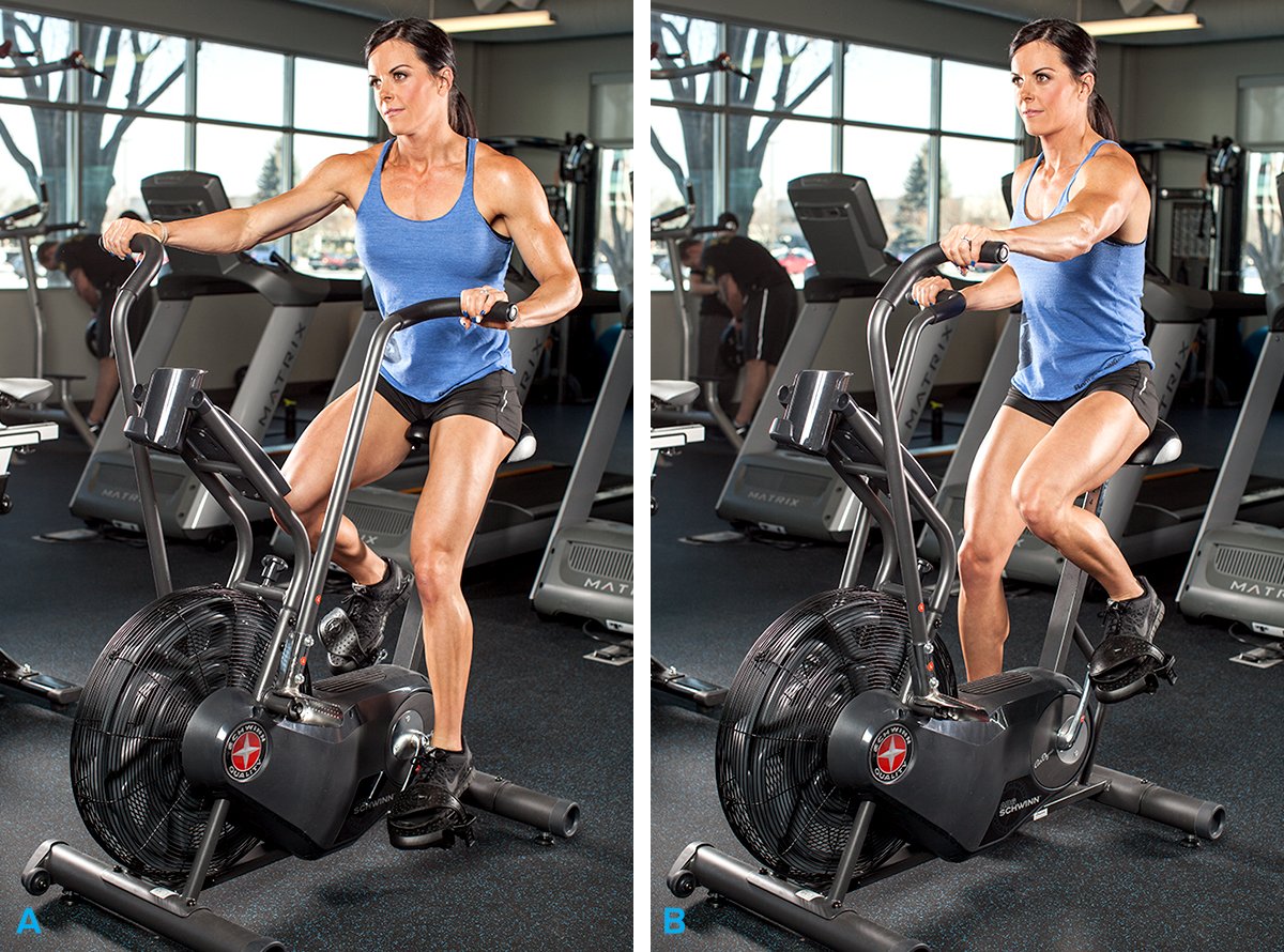 Woman cycling on stationary bike