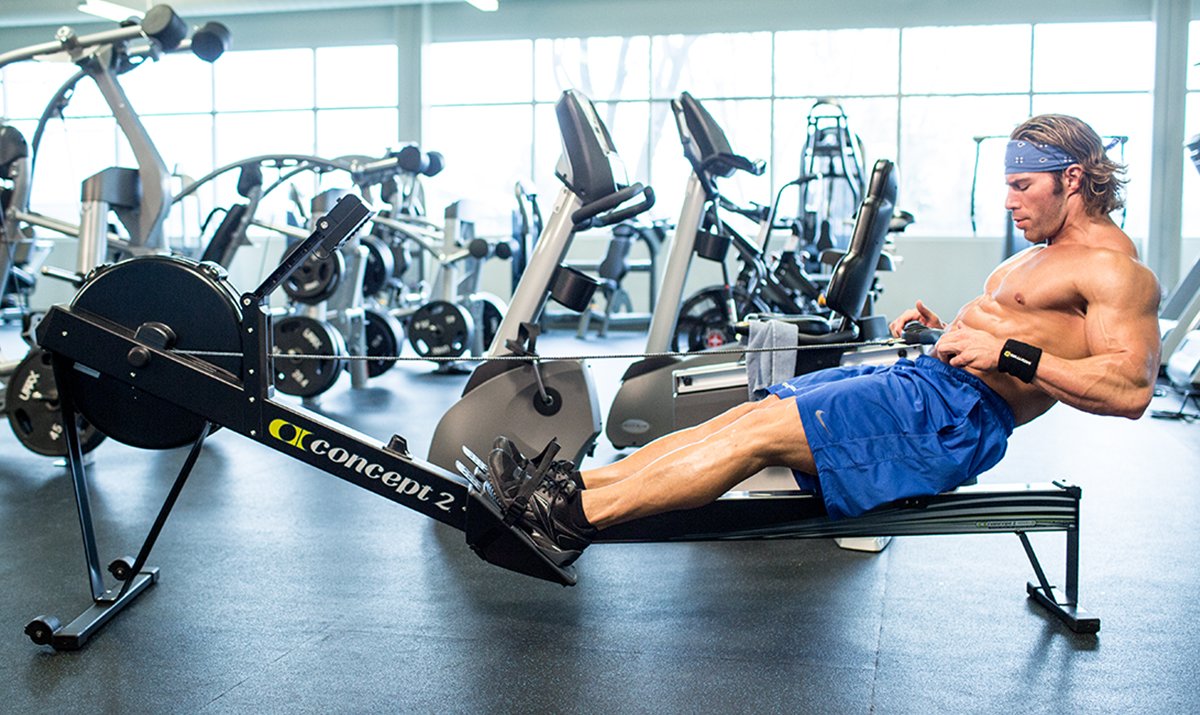 Man using rowing machine