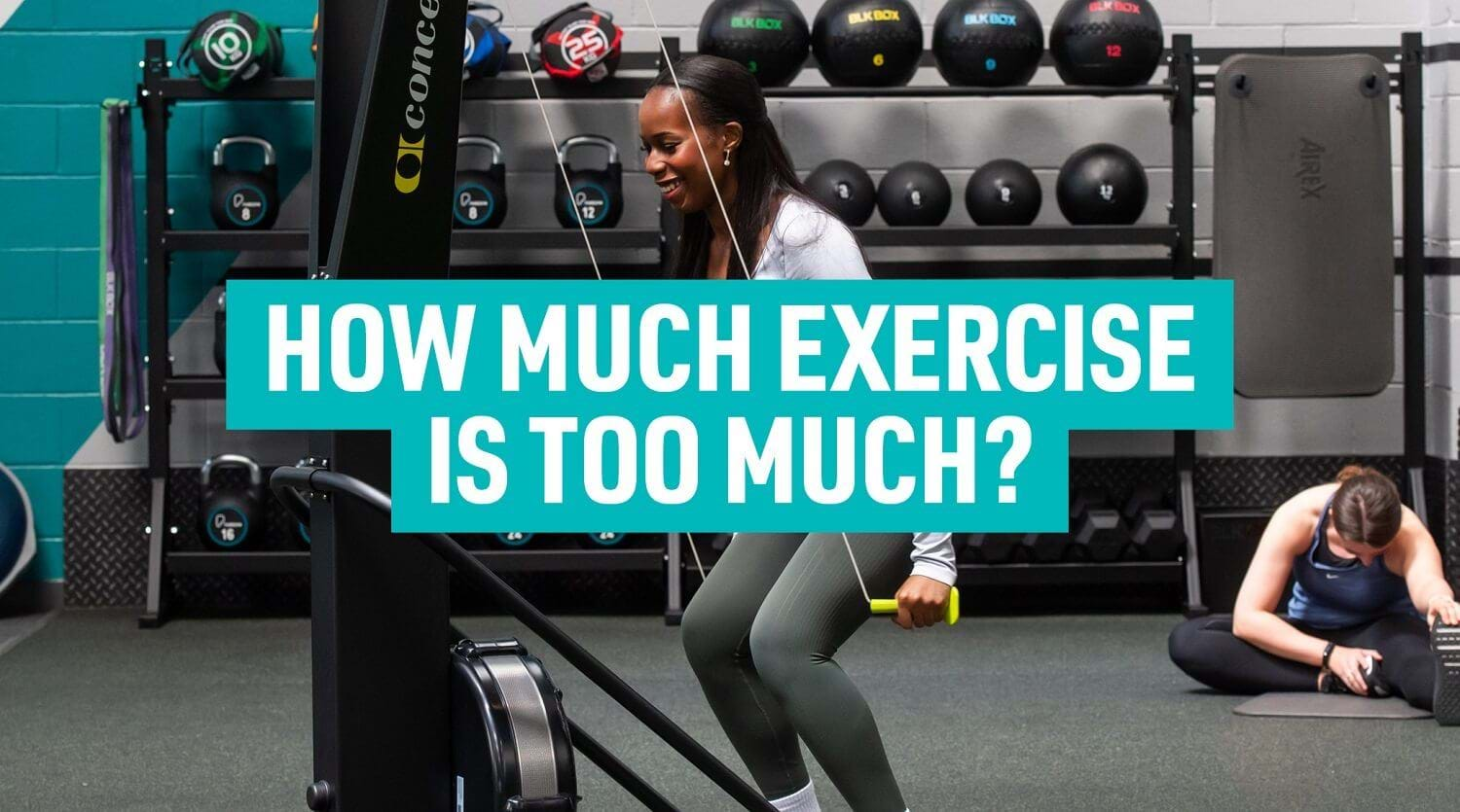 Woman exercising on gym machine