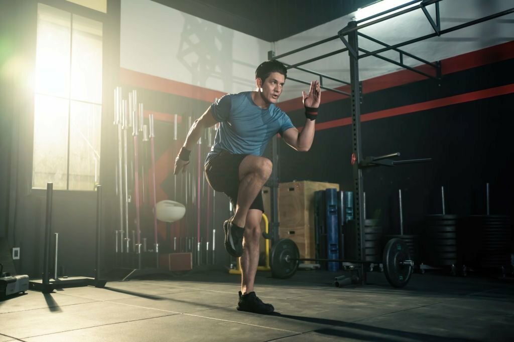 Man warming up before weightlifting session