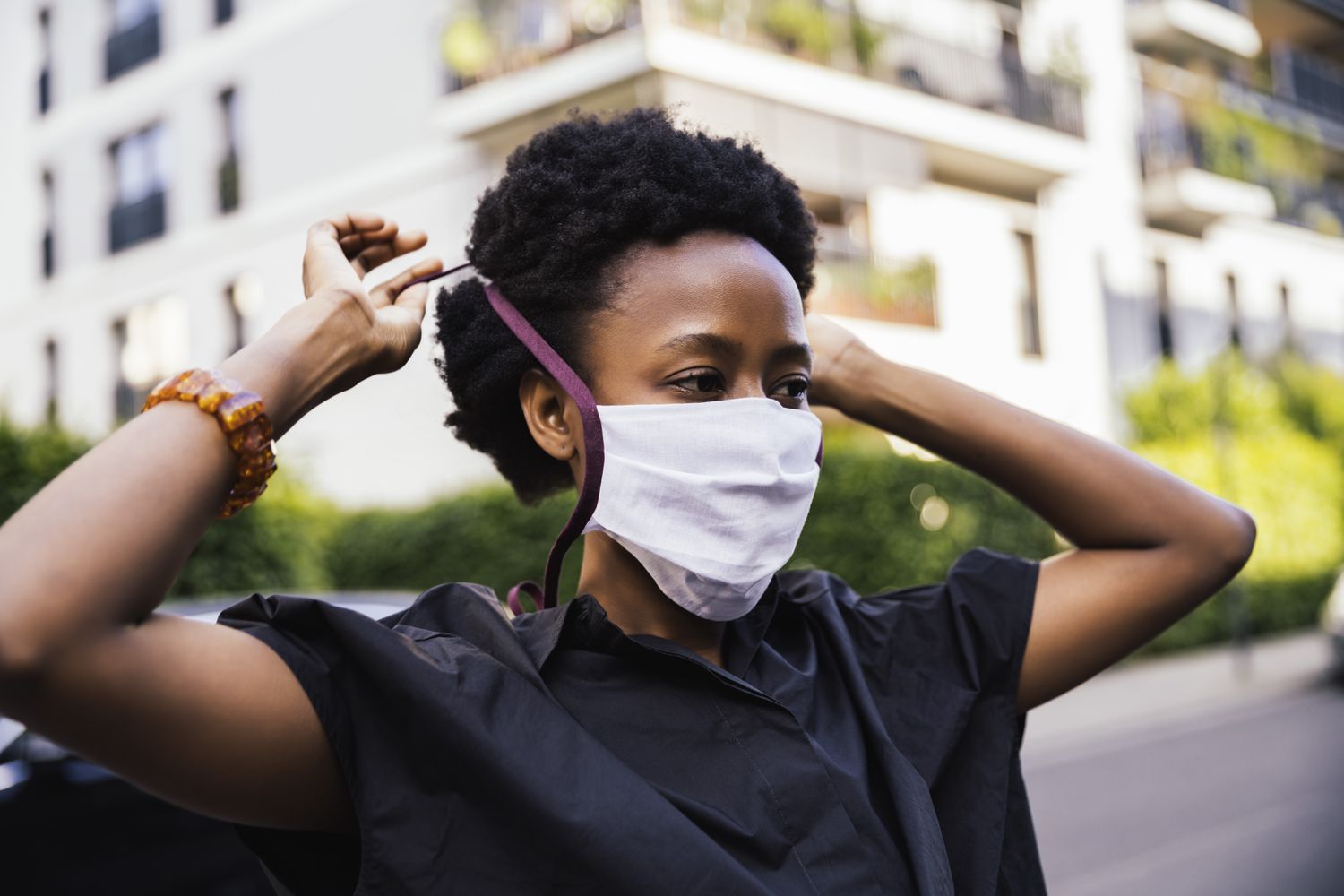 Woman wearing blue surgical face mask