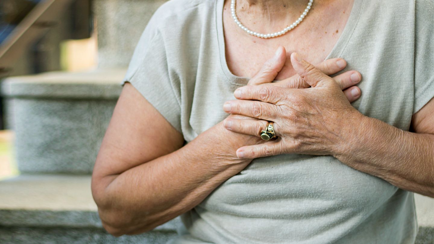 Woman experiencing chest pain from embolism