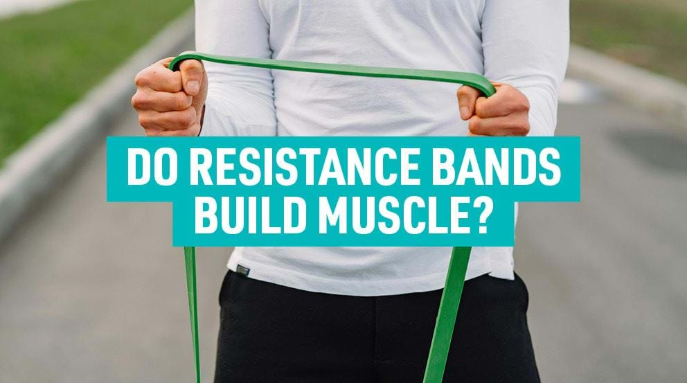 Man stretches green resistance band