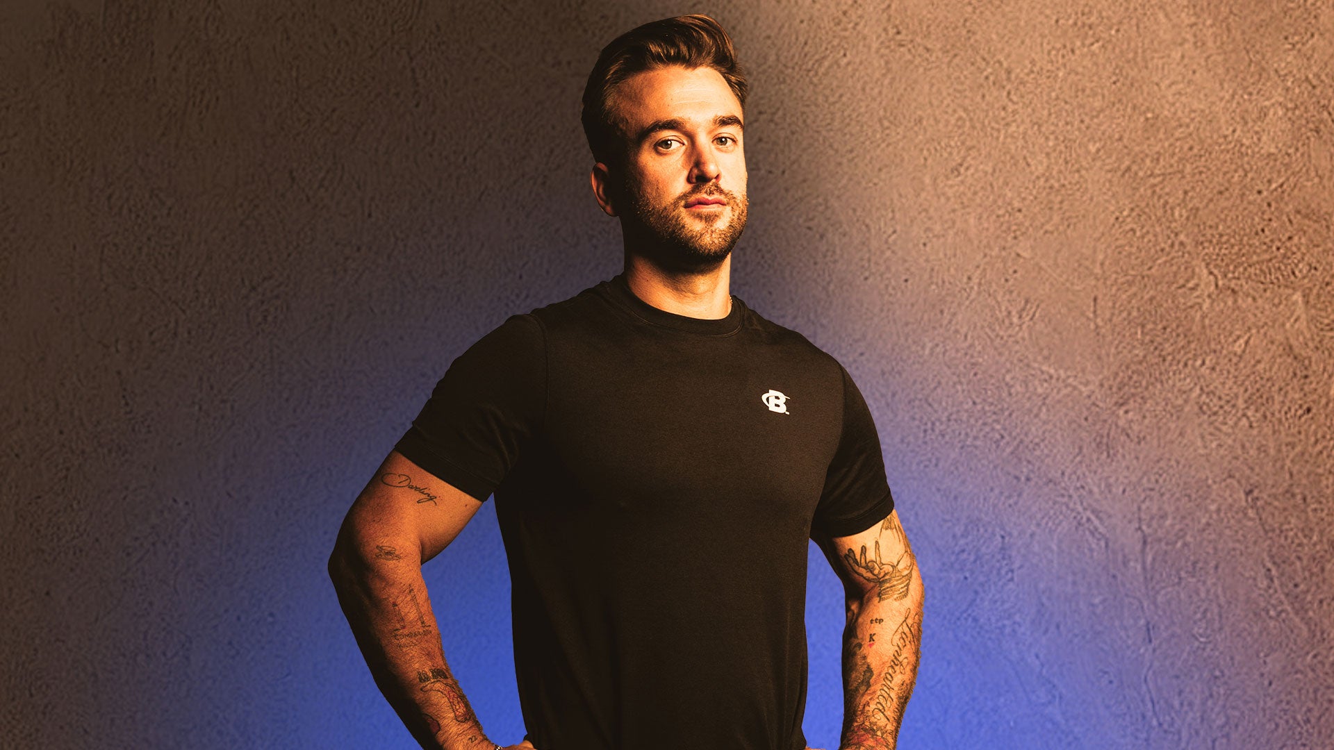 Headshot of man wearing black shirt