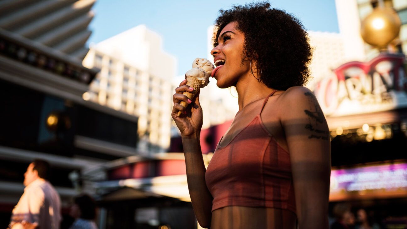 Woman enjoying vanilla ice cream