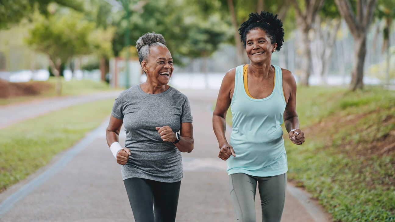 Two women running outdoors