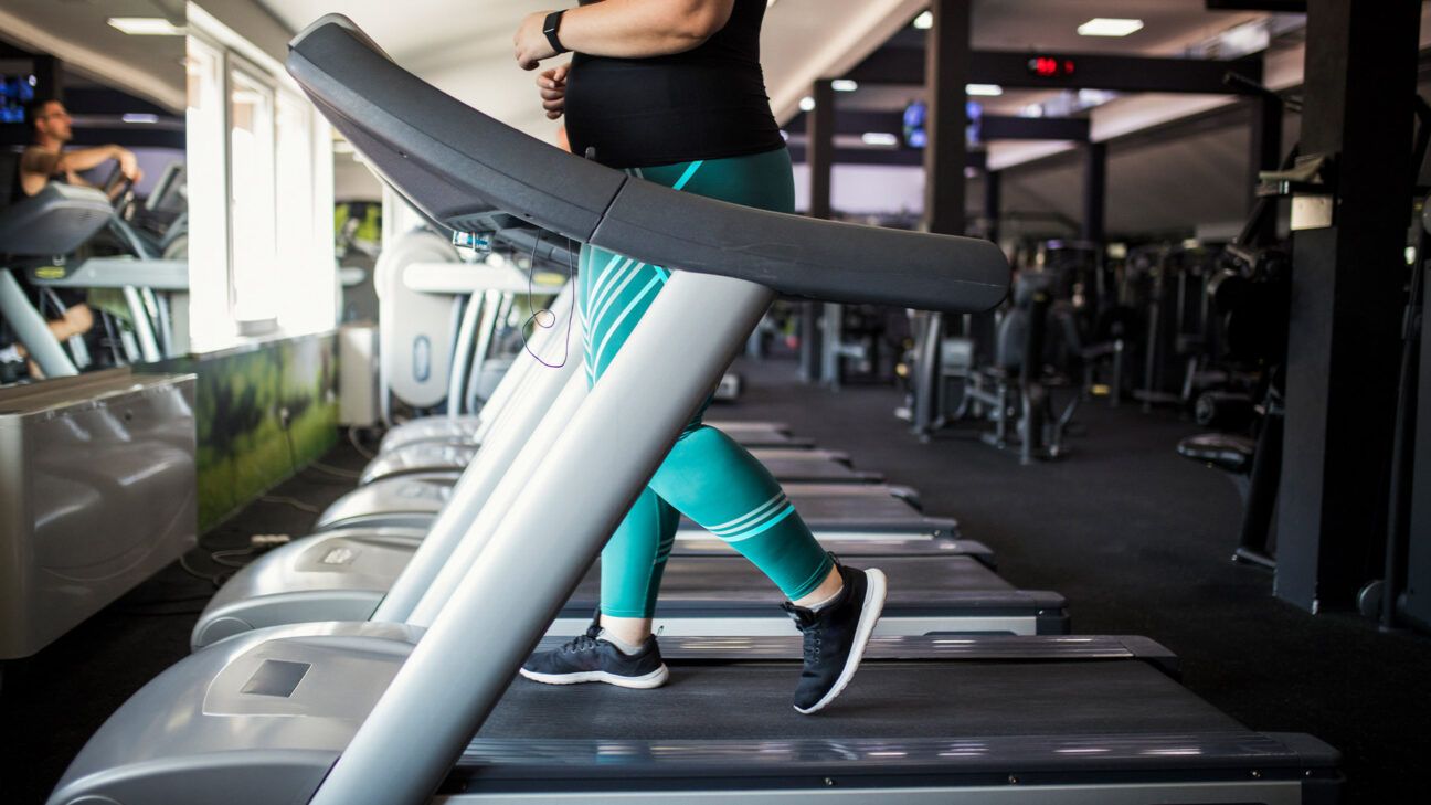 Female running on indoor treadmill