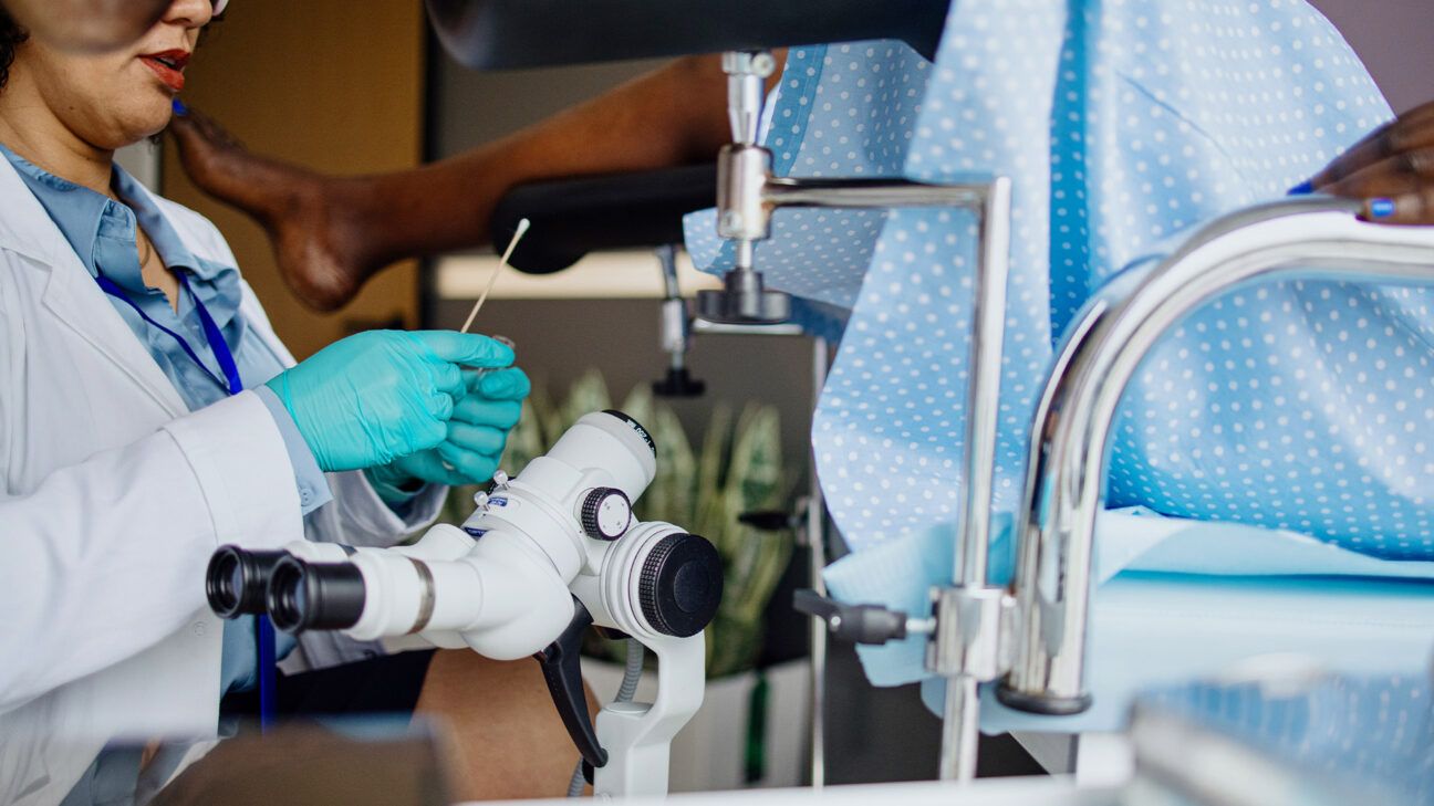 Doctor performing gynecological examination