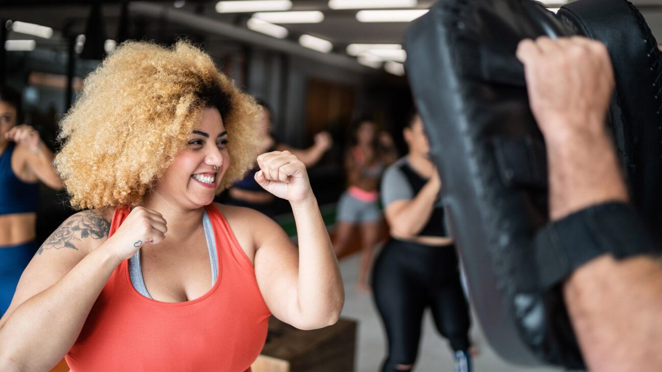 Women exercising together in gym