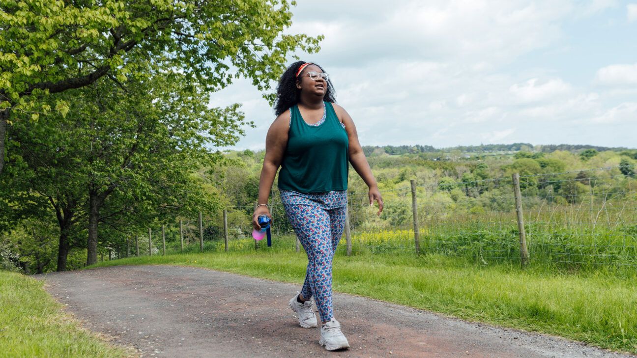 Woman hiking on outdoor trail