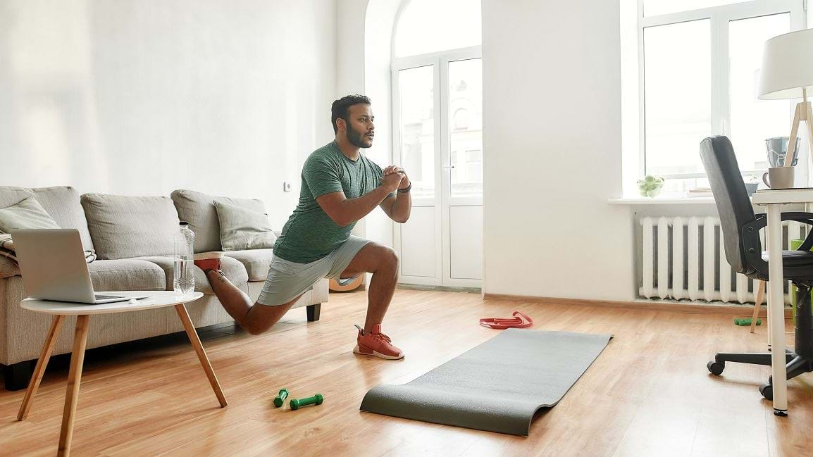 Man doing strength training at home