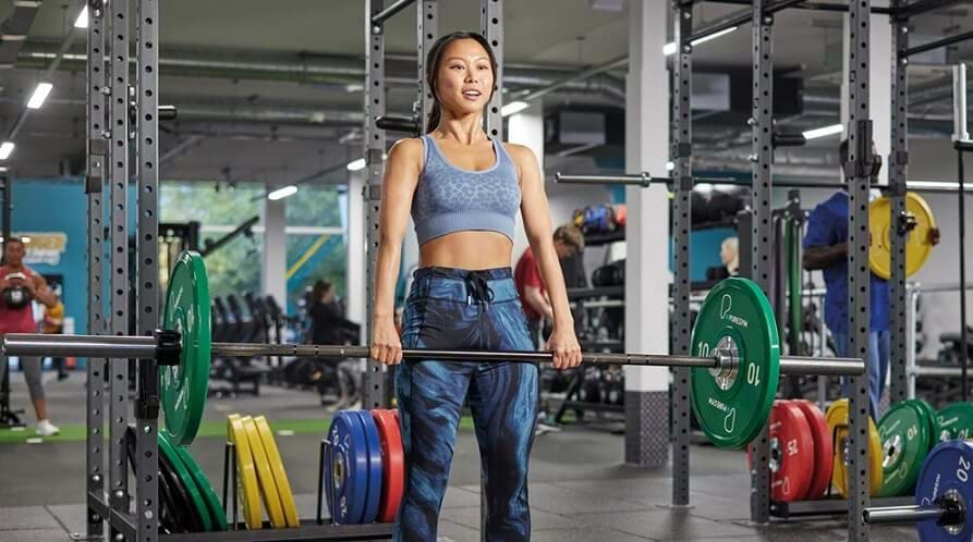 Woman lifting weights during workout