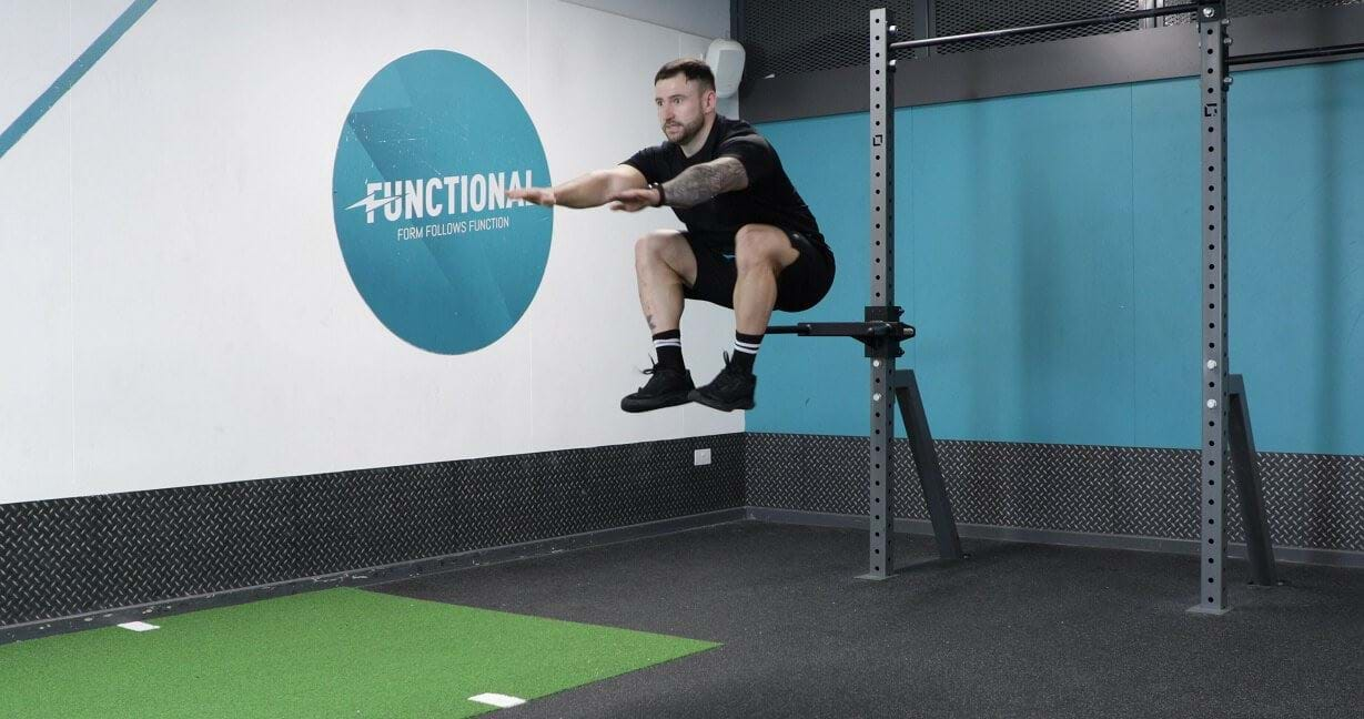 Person performing tuck jump exercise