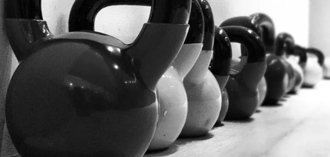 Row of black kettlebells