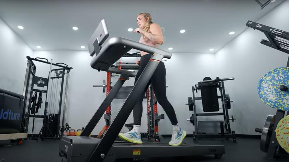 Woman jogging on Feier treadmill