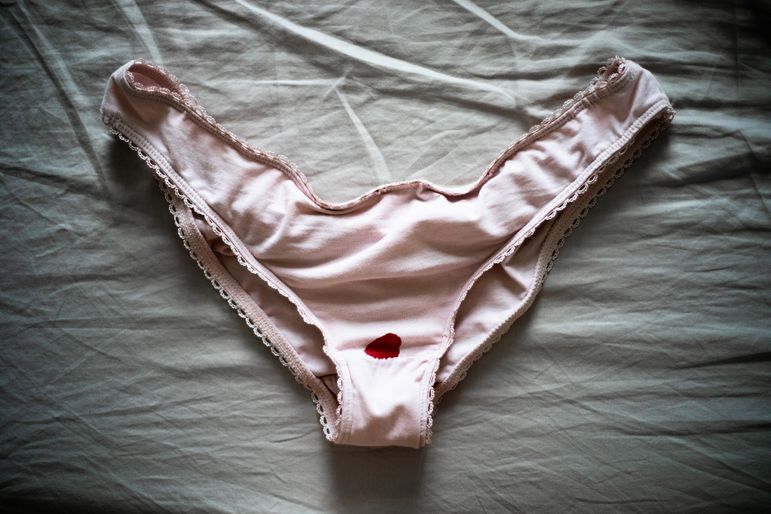 Pink underwear showing implantation bleeding